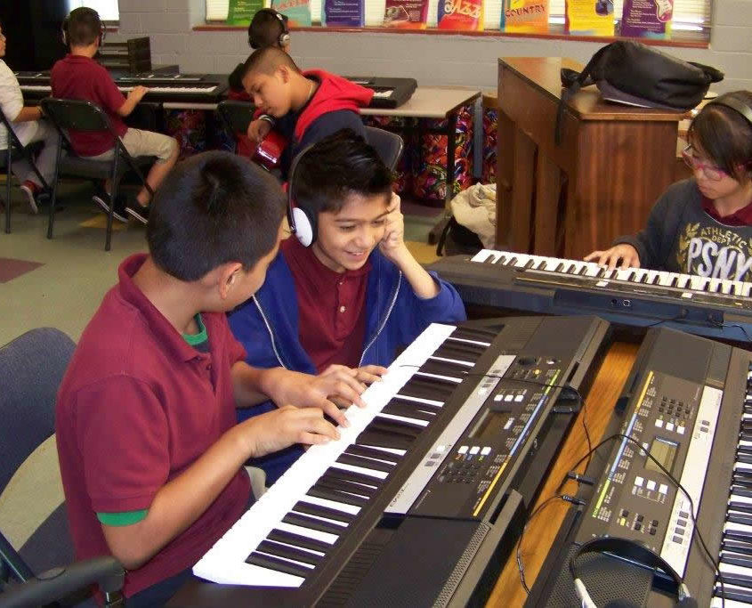 Students learning music Students learning music